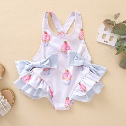 New cross-border Instagram summer children's clothing: a cake-print, double-bow cross-back swimsuit with a wide, open-back lace bodysuit.
