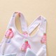New cross-border Instagram summer children's clothing: a cake-print, double-bow cross-back swimsuit with a wide, open-back lace bodysuit.