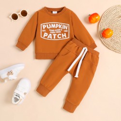 Amazon children's clothing. Classic black and white checkerboard autumn and winter long-sleeved trousers with front ties for infants and toddlers, fashionable sweatshirts and pants.