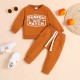 Amazon children's clothing. Classic black and white checkerboard autumn and winter long-sleeved trousers with front ties for infants and toddlers, fashionable sweatshirts and pants.