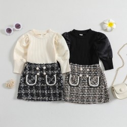 New cross-border girls' clothing: a European and American, Chanel-style skirt set with a round neck, long sleeves, and puff sleeves.