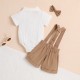 Cute European and American summer casual children's clothing: shoulder-tied floral print. Ribbed elastic waist jumpsuit